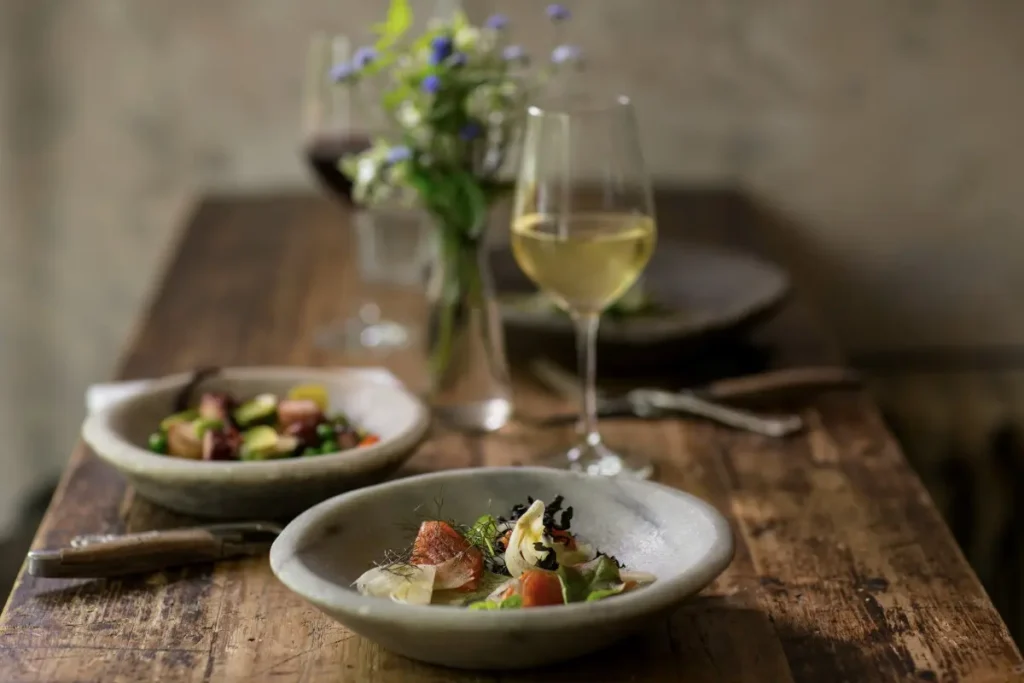 Plated dishes with wine show how thoughtful food pairing creates balanced flavors and a better dining experience.